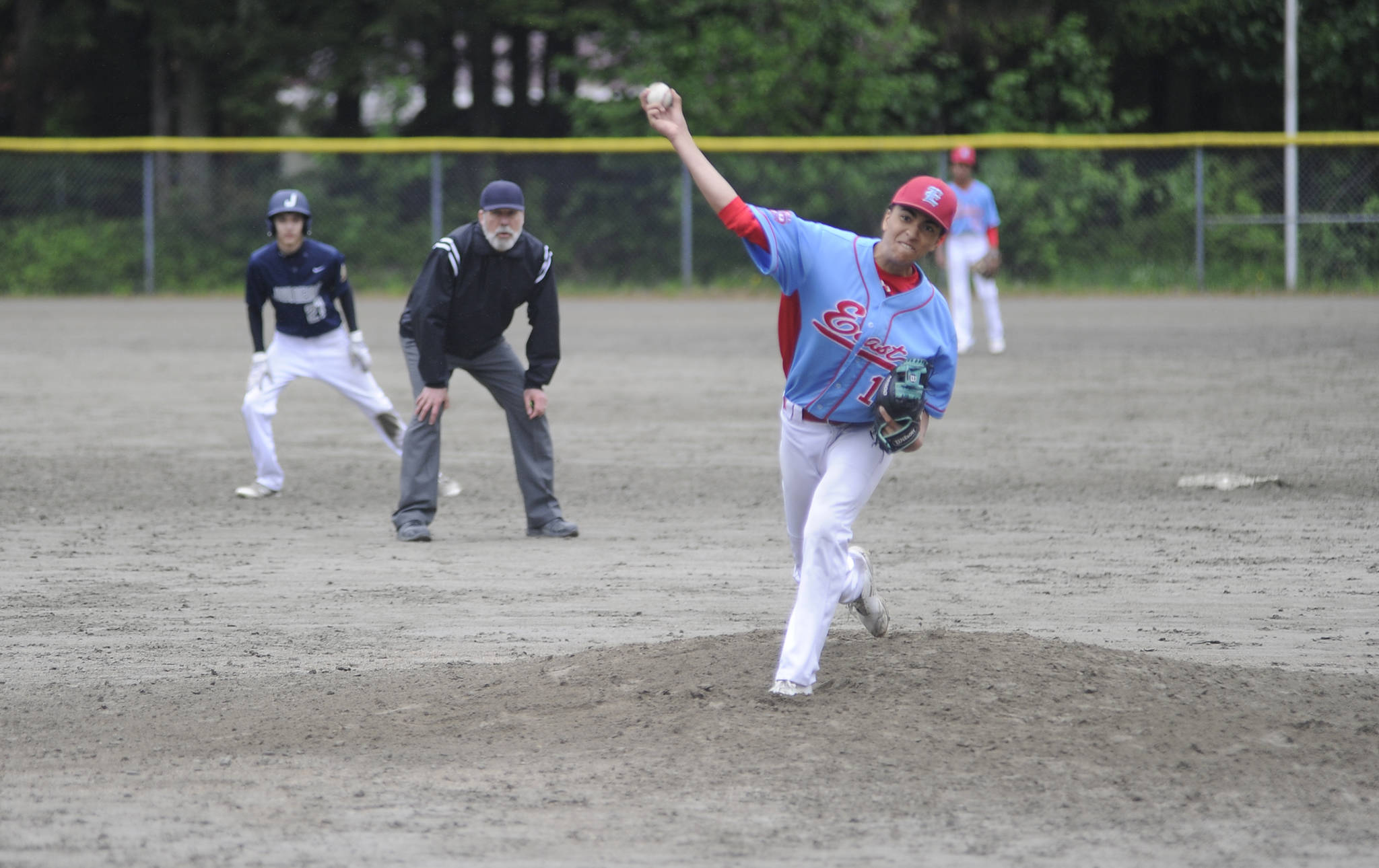 East Post 34 player Charlie White pitches against Juneau Post 25 at Adair-Kennedy Memorial Field in the first game of a doubleheader on Saturday. Juneau won 12-2. (Nolin Ainsworth | Juneau Empire)