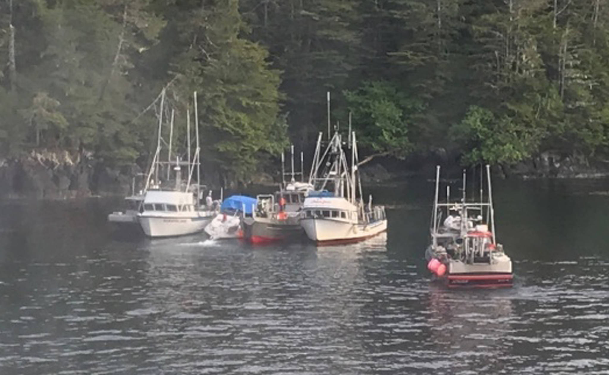 Good Samaritan vessels assist three adults and three children after their 27-foot cabin cruiser began taking on water near Long Island in Sitka Sound, Alaska, June 19, 2018. (U.S. Coast Guard | Courtesy Photo)