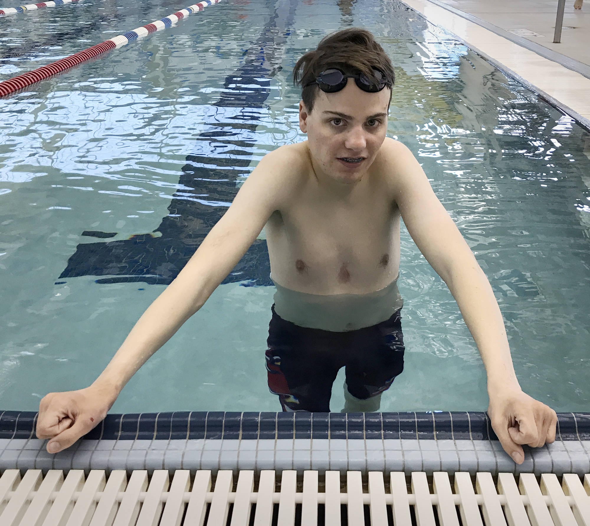 Nolan Harvey trains at the Dimond Park Aquatic Center on Tuesday. Harvey is just one of two swimmers on Team Alaska competing in the Special Olympics USA Games in Seattle next week. (Michael Penn | Juneau Empire)