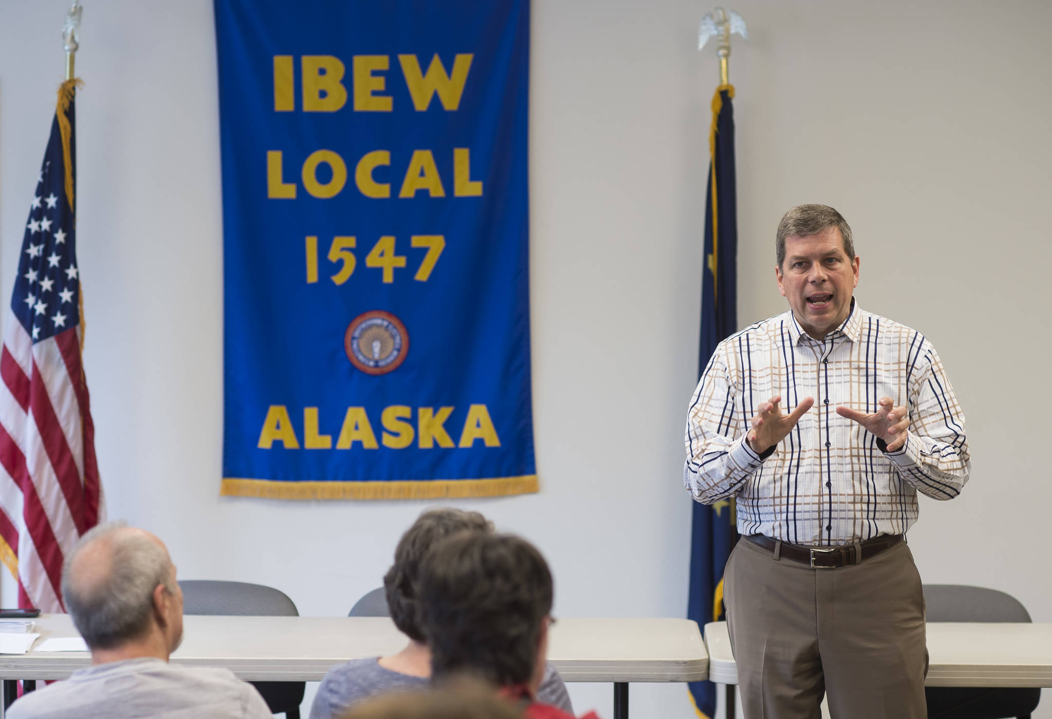 Former Alaska U.S. Senator Mark Begich greets and speaks to Juneau residents interested in his campaign for governor at the IBEW Local 1547 Union office on Thursday, June 29, 2018. (Michael Penn | Juneau Empire)