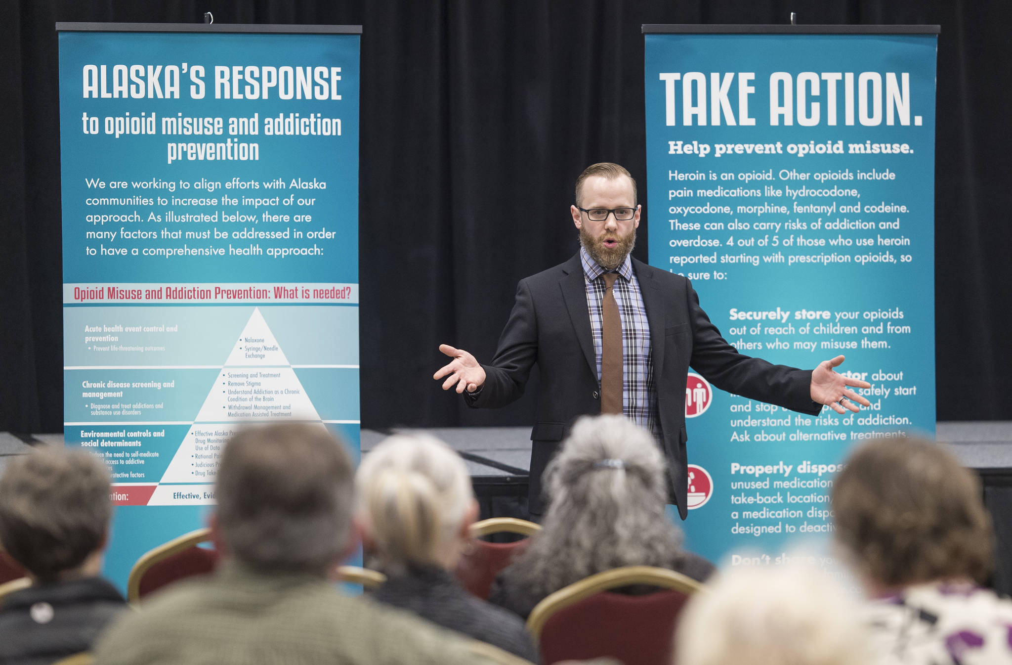 Andy Jones, director for the Alaska Office of Substance Misuse and Addiction Prevention, speaks during a community meeting in the Elizabeth Peratrovich Hall on Tuesday, March 27, 2018, on what Juneau needs to fight opioid misuse. (Michael Penn | Juneau Empire File)