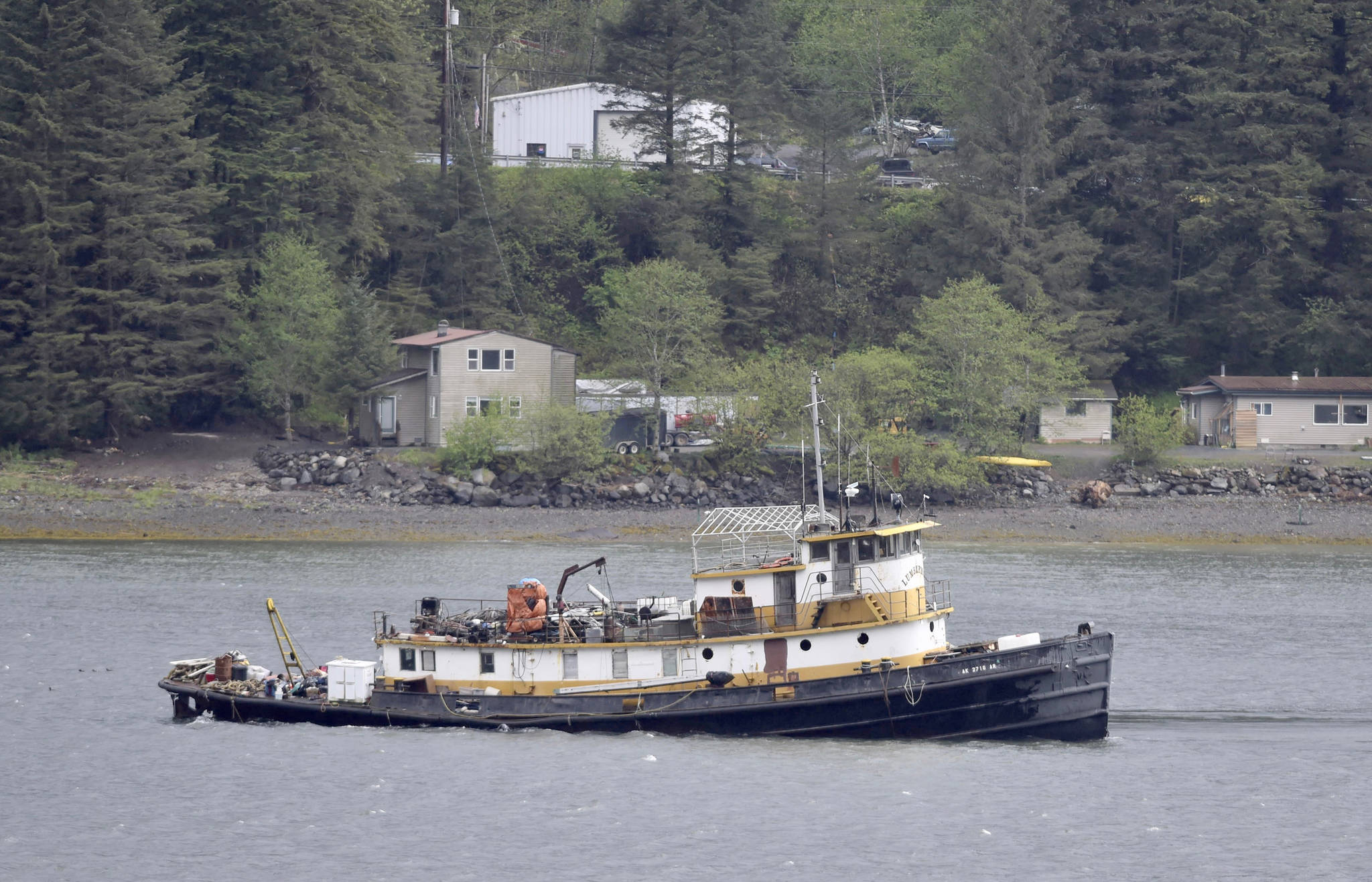 The tugboat Lumberman is seen aground in Gastineau Channel on Monday, May 21, 2018. (Michael Penn | Juneau Empire photo)
