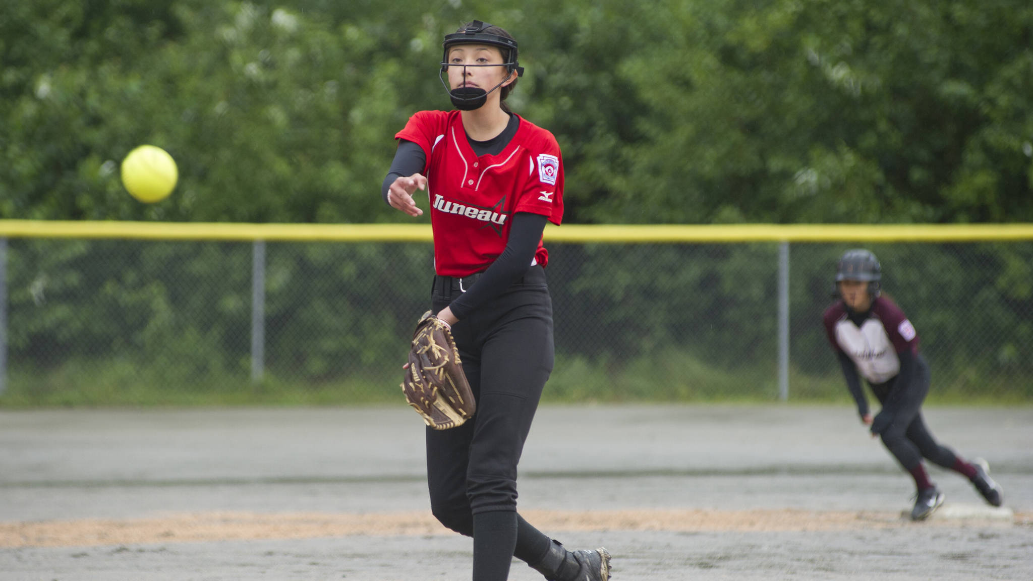 Gastineau Channel Little League’s Kiah Yadao pitches in the first inning of the Alaska District 2 Major Softball Championship Game against Ketchikan Little League on Tuesday at Melvin Park. (Nolin Ainsworth | Juneau Empire)