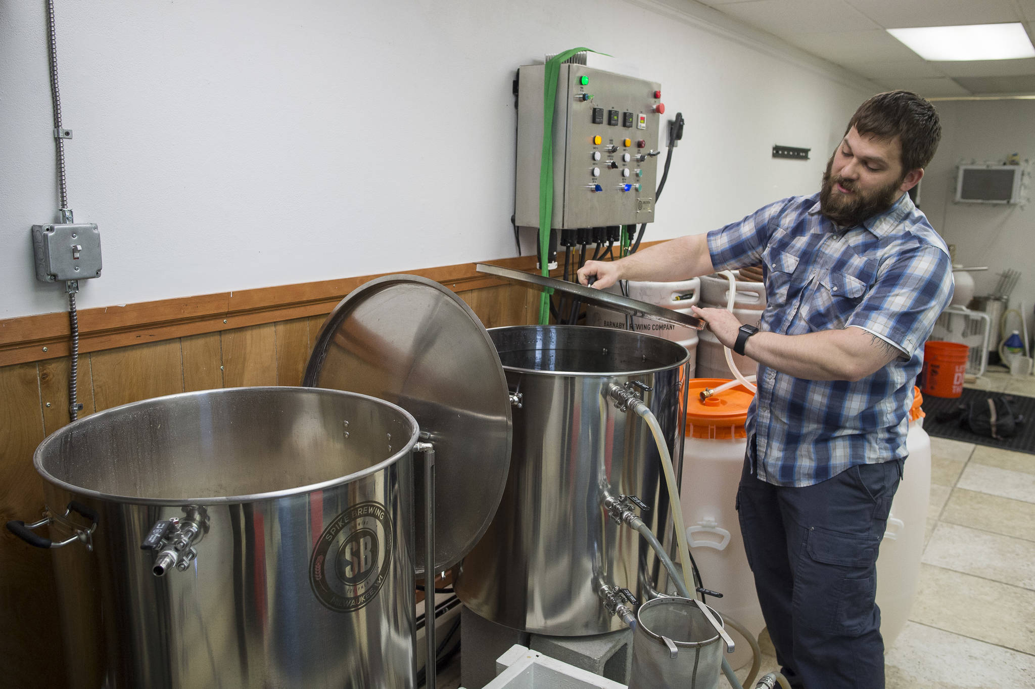 Matt Barnaby of Barnaby Brewing, talks about brewing a beer at his North Franklin location on Monday, April 9, 2018 before a fire closed the brewery. Barnaby recently won an award for its “I’ll Have Another 2018” smoked beer. (Michael Penn | Juneau Empire)