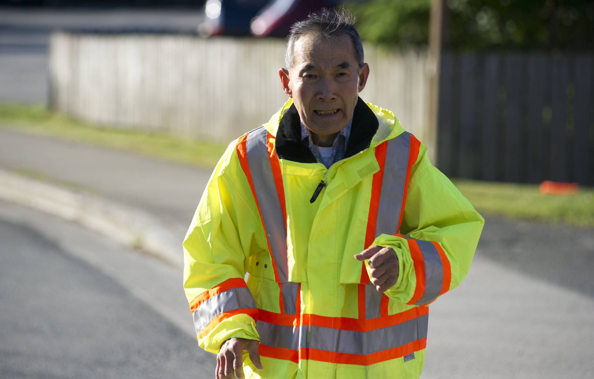 Richard “Dick” Goto, 75, finishes his 2-mile run on James Boulevard in the Mendenhall Valley on Friday. (Nolin Ainsworth | Juneau Empire)