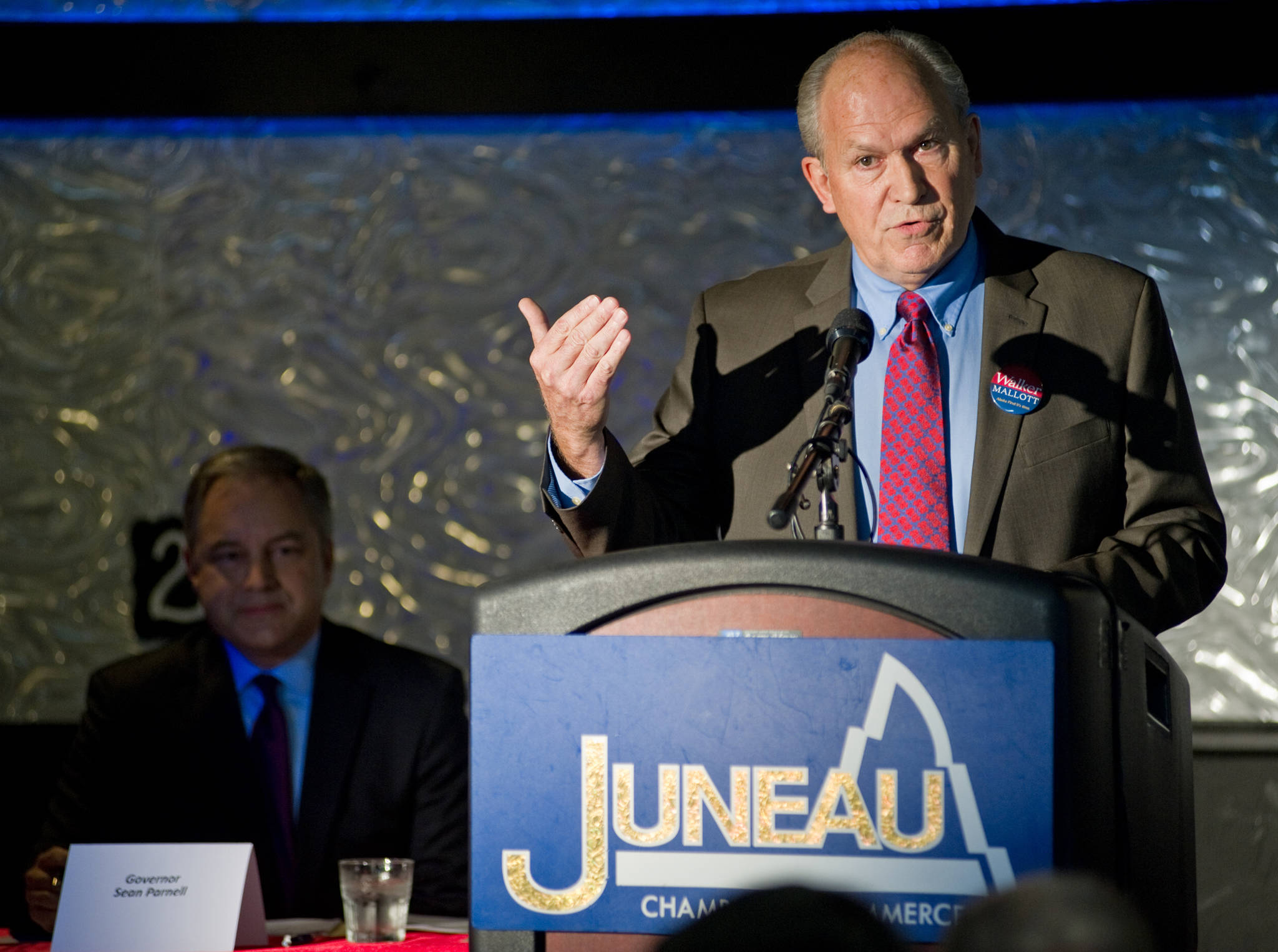 In this Sept. 29, 2014 photo, candidate for governor Bill Walker speaks as Gov. Sean Parnell listens during their debate in front of the Juneau Chamber of Commerce at Suite 907. (Michael Penn | Juneau Empire File)