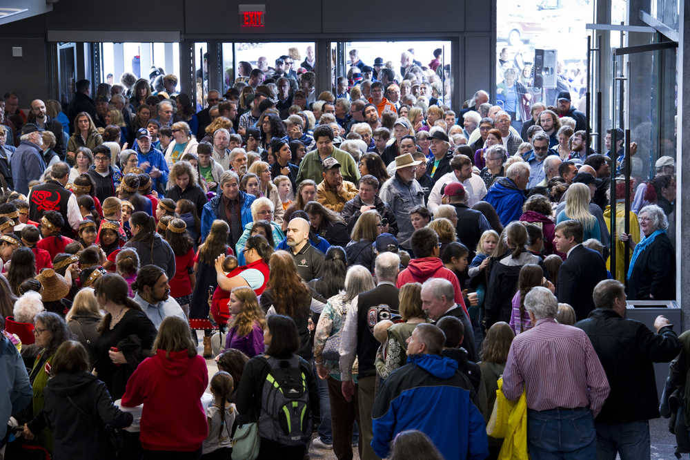 Juneau residents and visitors crowd into the Father Andrew P. Kashevaroff building housing the State Library, State Archives and State Museum during the Grand Opening in 2016. (Michael Penn | Juneau Empire file)