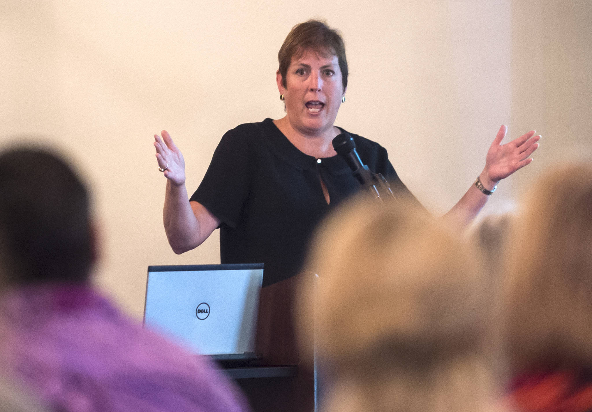 Angela Rodell, Executive Director of the Alaska Permanent Fund Corporation, speaks to the Juneau Chamber of Commerce during their weekly luncheon at the Moose Lodge on Thursday, July 26, 2018. (Michael Penn | Juneau Empire)