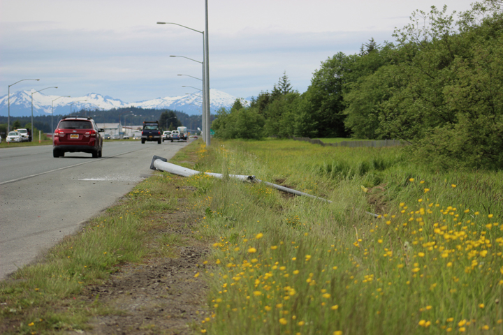 The damaged light pole on Egan Drive, seen Tuesday