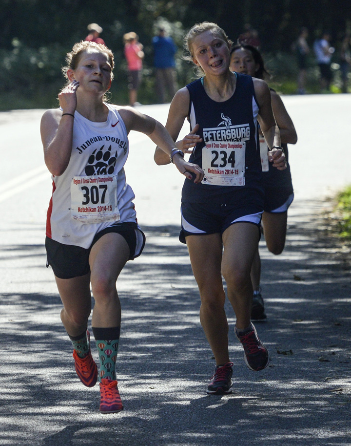 Runners race in a cross country meet Saturday, Aug. 27 at Ward Lake in Ketchikan.