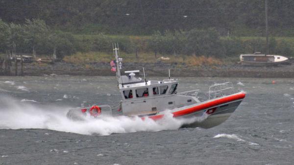 A Coast Guard Station Juneau Response Boat-Medium heads down Gastineau Channel in September 2011 into strong winds and white-capped waters.