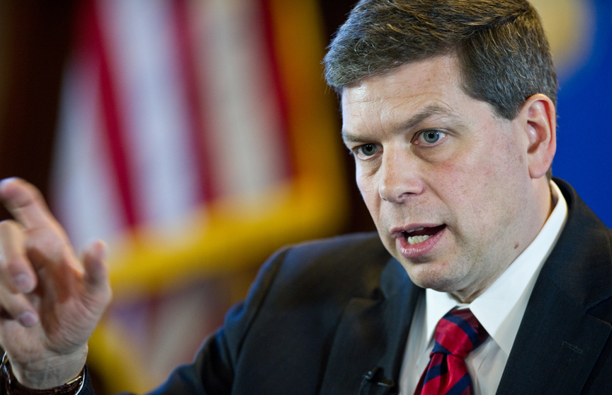 In this file photo from March 2014, Alaska Sen. Mark Begich speaks to reporters after his annual speech to a joint session of the Alaska Legislature.