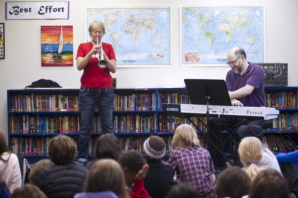 Alaska jazz composer and trumpet player Yngvil Vatn Guttu performs with keyboardist Rob Cohen for students at the Juneau Community Charter School on Friday.