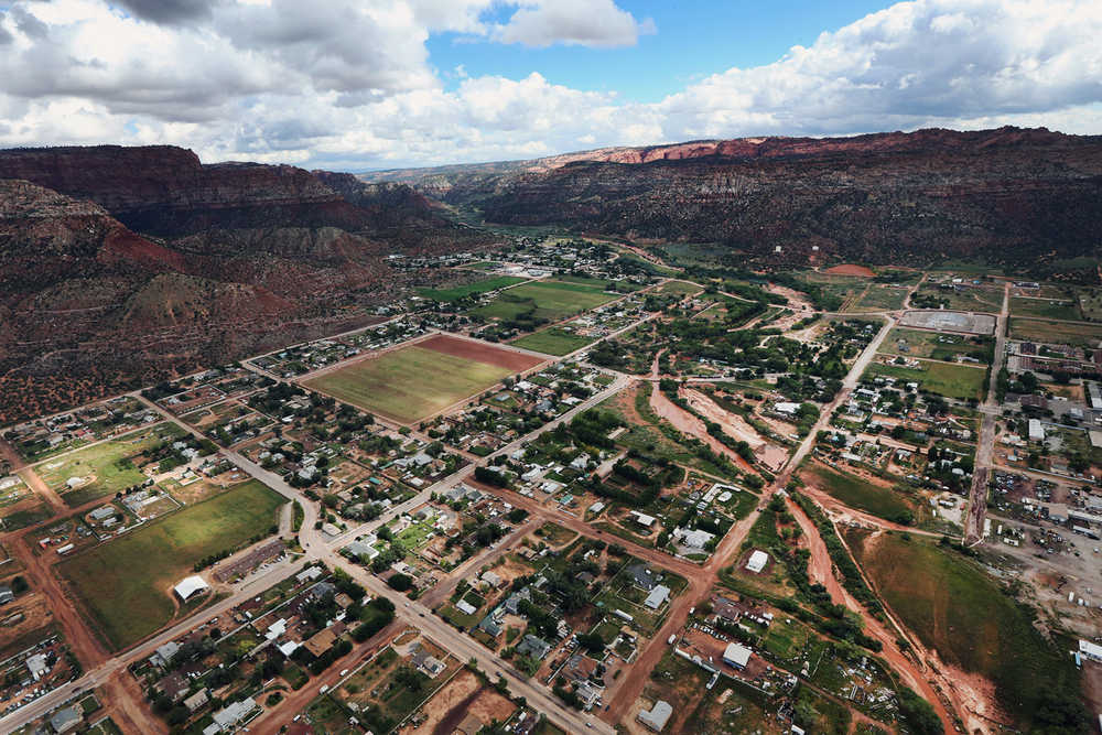 This Sept. 16  photo, shows an aerial photo of Hildale, Utah. The secluded polygamous towns tucked between stunning red-rock cliffs have survived for more than 100 years, despite Utah and Arizona's efforts to dismantle them and expose abuses.