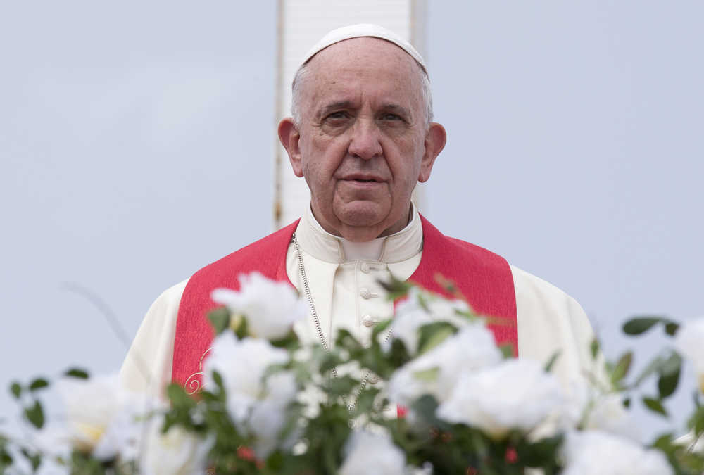 Pope Francis looks out from the Hill of the Cross in Holguin, Cuba, Monday, Sept. 21, 2015. Francis traveled to Cuba's fourth-largest city, Holguin, to celebrate a Mass at the Plaza of the Revolution, and visit the pilgrimage site, before heading to Santiago de Cuba. (AP Photo/Alessandra Tarantino, Pool)