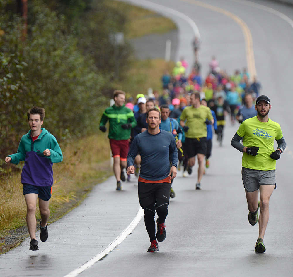 Soren Thompson, Hiram Henry and Bryan Hitchcock lead Sunday's annual Hasty Half Marathon. This year's fundraising run proceeds will be given to the Juneau Suicide Prevention Coalition.