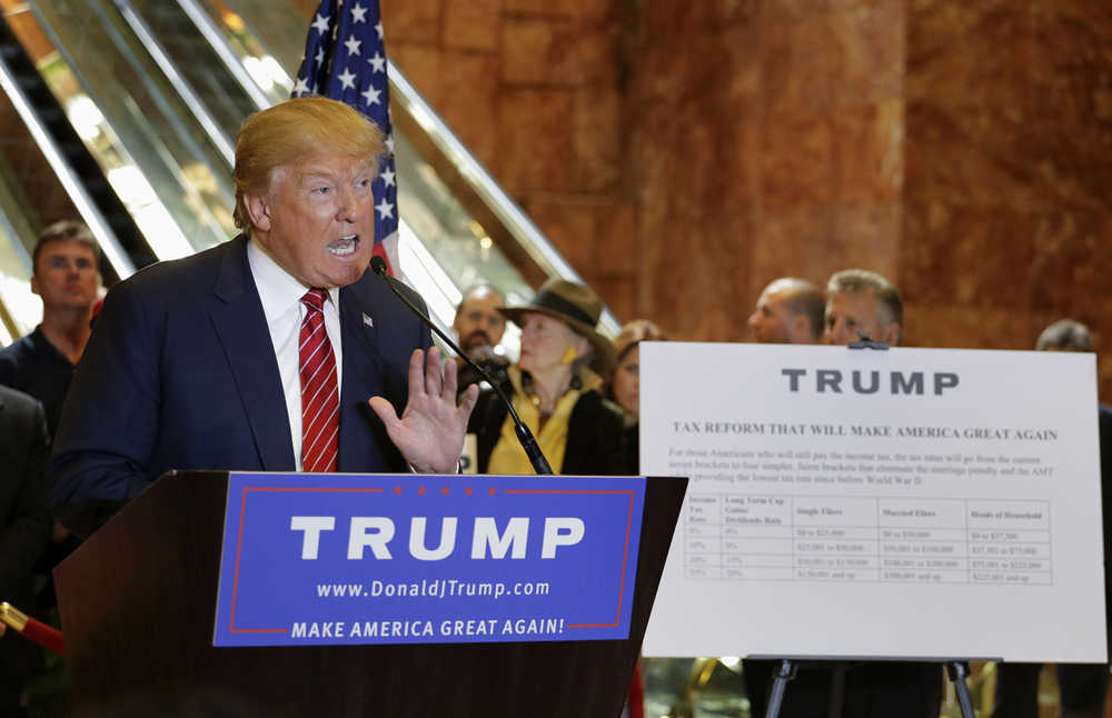 Republican presidential candidate Donald Trump talks about his tax plan during a news conference, Monday, Sept. 28, 2015, in New York. The Republican front-runner is calling for an overhaul of the tax code that would eliminate income taxes for millions of Americans, while lowering them for the highest-income earners and business.(AP Photo/Julie Jacobson)