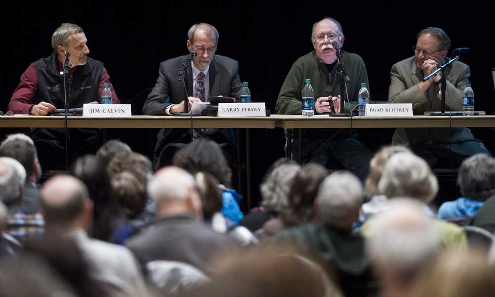 Panelist Jim Calvin, left, Larry Persily, Brad Keithley and Gregg Erickson give an analysis of the state's approach to its budget deficit during the Juneau Forum on Alaska's Fiscal Future at Centennial Hall on Wednesday.