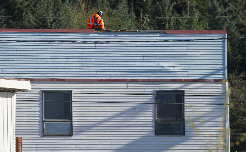 A crew from North Pacific Erectors works on the Juneau Urgent & Family Care building on Old Dairy Road on Friday.