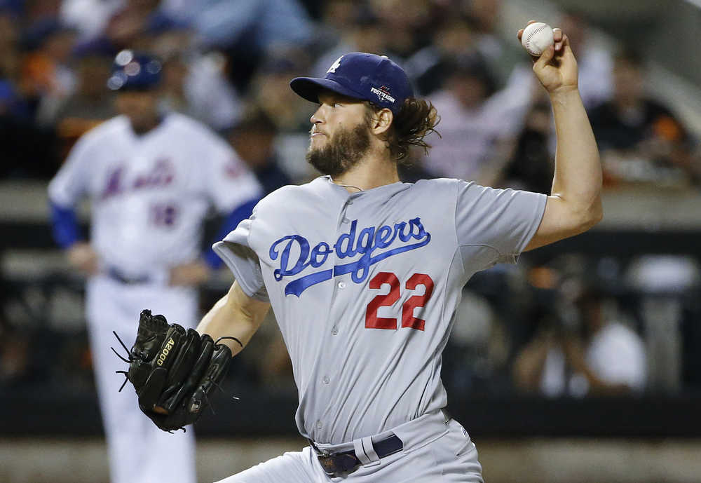 Los Angeles Dodgers pitcher Clayton Kershaw (22) delivers against the New York Mets during the first inning of baseball's Game 4 of the National League Division Series, Tuesday, Oct. 13, 2015, in New York. (AP Photo/Kathy Willens)