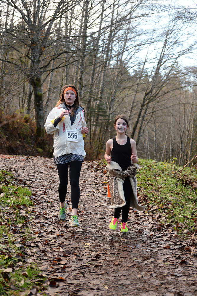 Runners navigate trails during Sunday's 4th Annual Zombie Run 5K or 1-mile run on the Treadwell Trails at Sandy Beach. The event was a fundraiser for the Harborview Elementary Triathlon Club.