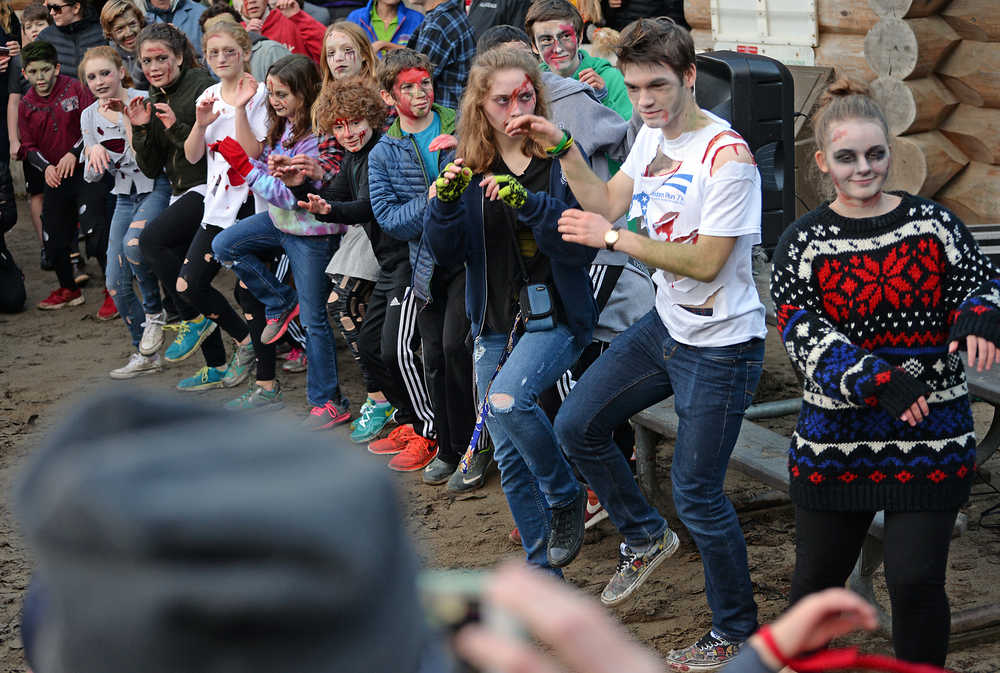 Zombies perform their rendition of Michael Jackson's "Thriller" during Sunday's 4th Annual Zombie Run 5K or 1-mile run on the Treadwell Trails at Sandy Beach. The event was a fundraiser for the Harborview Elementary Triathlon Club.