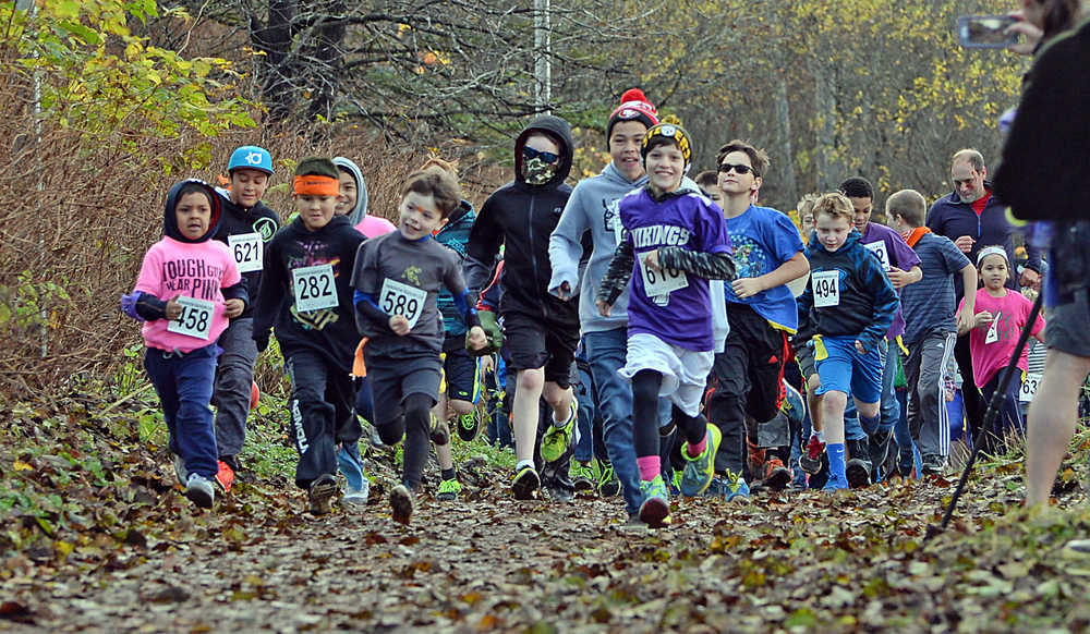 The first wave of runners start Sunday's 4th Annual Zombie Run 5K or 1-mile run on the Treadwell Trails at Sandy Beach. The event was a fundraiser for the Harborview Elementary Triathlon Club.