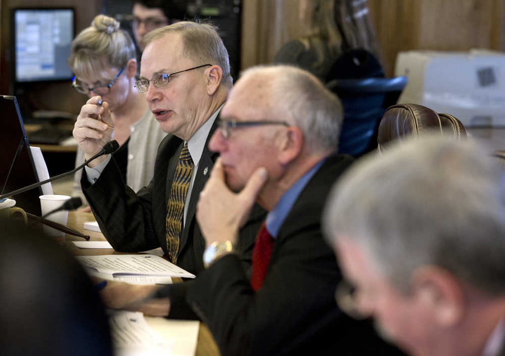 Rep. Mark Neuman, R-Big Lake, asks a question during a presentation by the Alaska Gasline Development Corporation during a House Finance Committee meeting at the Capitol on Tuesday.
