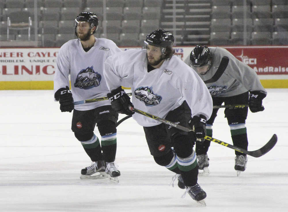 Liam Stewart, second from right, skates during practice for the Alaska Aces hockey team in Anchorage. Stewart, the son of rock superstar Rod Stewart and supermodel Rachel Hunter, says he just wants to be treated as one of the guys.