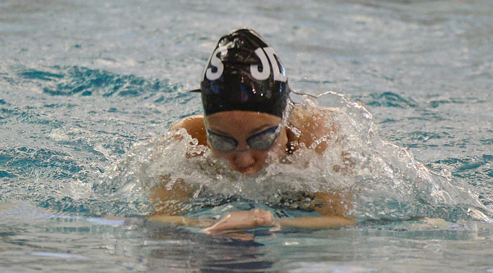 Juneau-Douglas High School junior Mia Ruffin swims in a meet this season. The Crimson Bears will compete at the Region V Championships in Sitka this weekend.