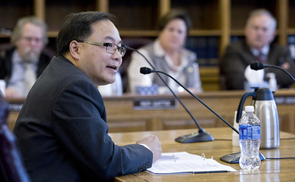 Vincent Lee, director of Major Projects Development for TransCanada, speaks about a proposed gasline buyout of TransCanada by the state to the House Finance Committee at the Capitol on Wednesday.
