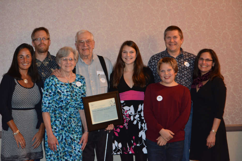 Julie and Peter Neyhart, shown third and fourth from left with members of their family, have been honored as Philanthropists of the Year by the Juneau Community Foundation.