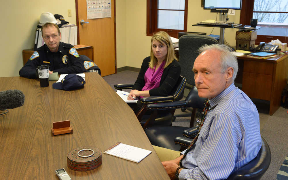 From left, Police Chief Sheldon Schmitt, Planning and Community Development Director Maegan Bosak and City Administrator Mark Gorman listen to reporters' questions today at City Hall.