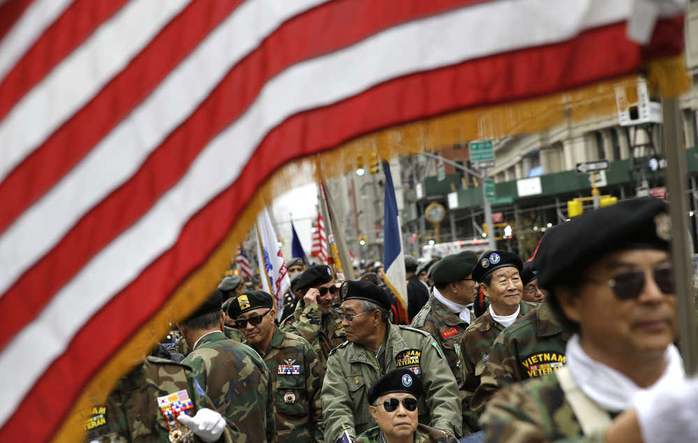 Korean Vietnam War veterans prepare to march in the annual Veteran's Day parade in New York Wednesday.