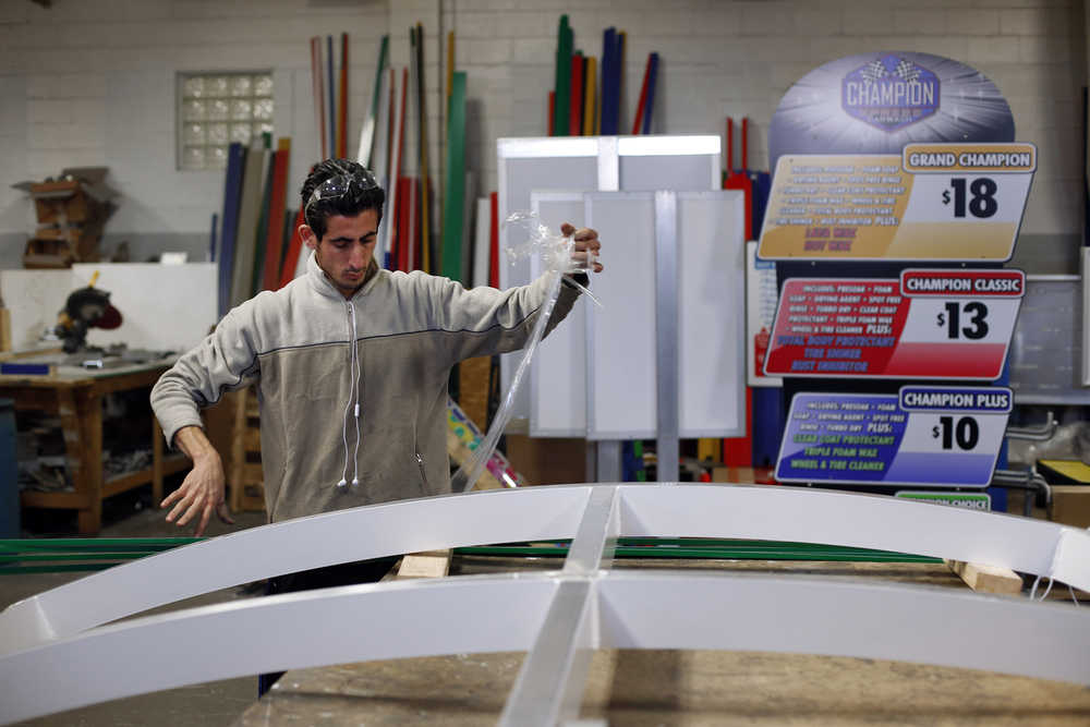 Syria refugee Nedal Al-Hayk works as a fabricator Monday in Warren, Michigan. Several U.S. governors are threatening to halt efforts to allow Syrian refugees into their states in the aftermath of the coordinated attacks in Paris, though an immigration expert says they have no legal authority to do so.