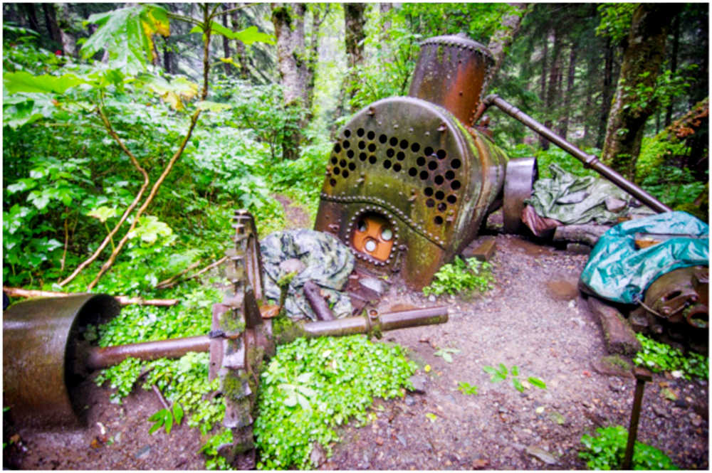 The boiler, Pelton Wheel and pump sit at the old mine site of the Boston Mine across Gold Creek in Cope Park.
