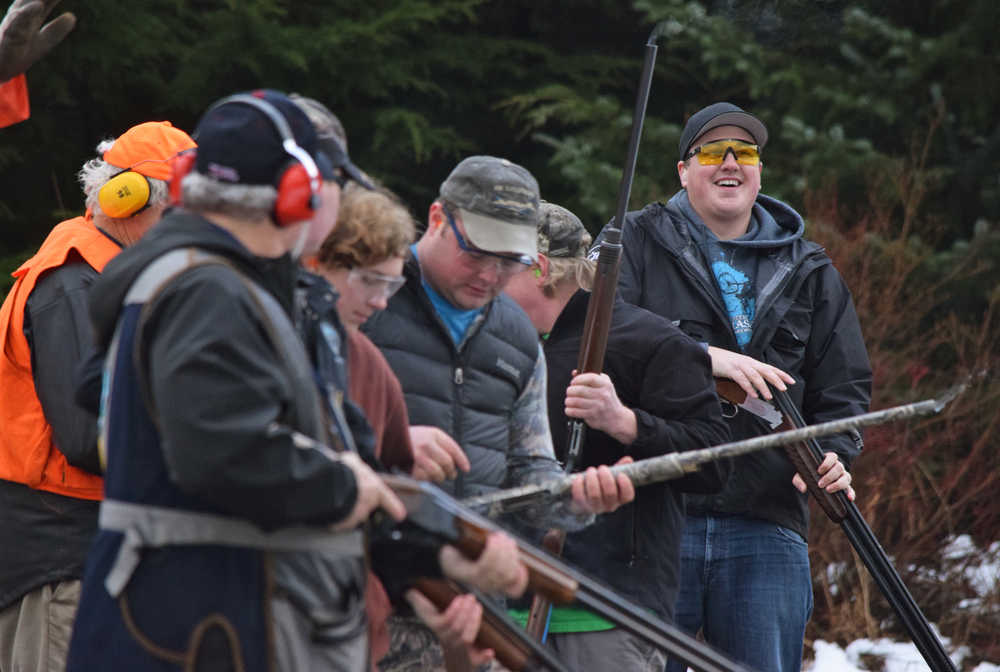 Eric Verrelli smiles after shooting in the Annie Oakley competition Saturday, Nov. 21, 2015 at the Juneau Gun Club's Turkey Shoot. Verrelli won the competition, winning a frozen turkey. The Gun Club, Juneau Shooting Sports Foundation, Juneau Archery Club and the Alaska Department of Fish and Game host the shooting competition each year as a fundraiser. Proceeds are divided by the three clubs, and any extra funds go to Helping Hands.