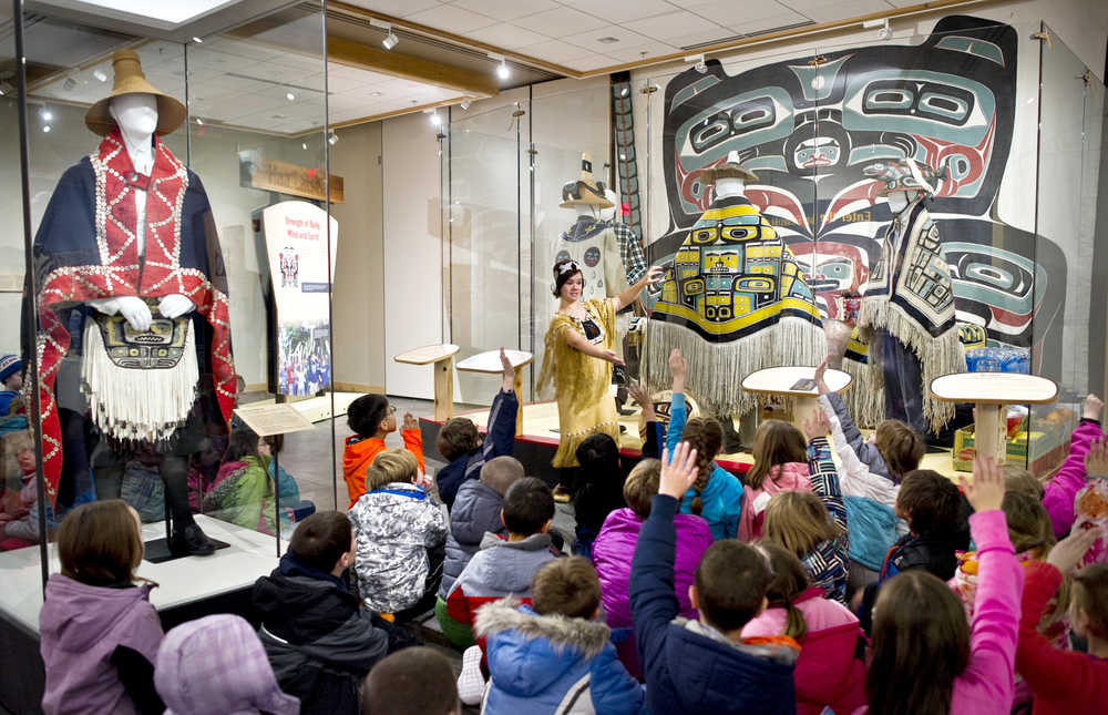 Tlingit weaver and teacher Lily Hope guides Auke Bay Elementary School second graders through the cultural exhibit in the Walter Soboleff Center on Nov. 19. The event was part of the Ensuring the Arts for Any Given Child program, which was founded by the Kennedy Center to create full access to arts education programs and resources for K-8 students. The Kennedy Center works with 18 sites in the country and Juneau is one of them. Starting in November, all second-grade students in the Juneau School District began to go on annual arts excursions to the Walter Soboleff Building to learn about the Tlingit, Haida and Tsimshian cultures.