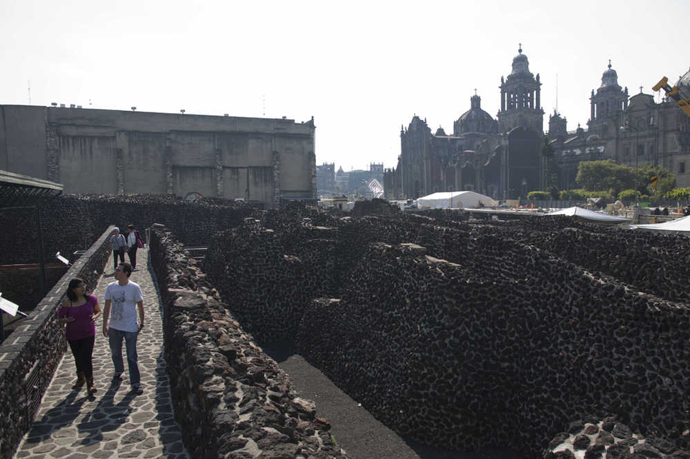 Tourists visit the Templo Mayor archaeological site in Mexico City on Tuesday.