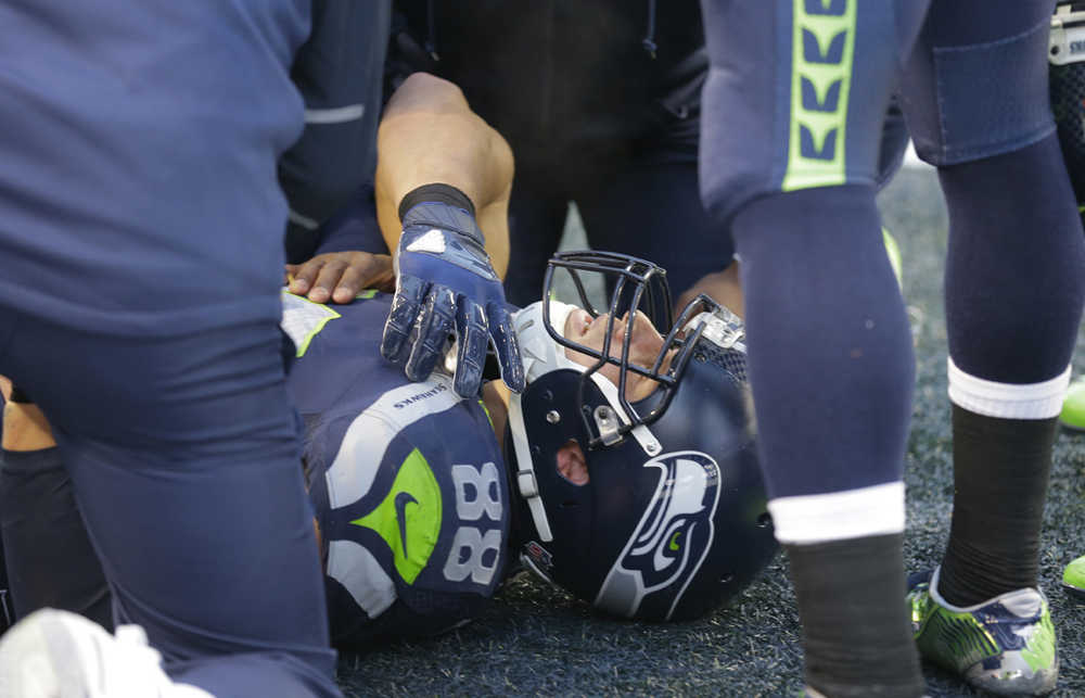 Seattle Seahawks' Jimmy Graham lies on the field after being injured Sunday.
