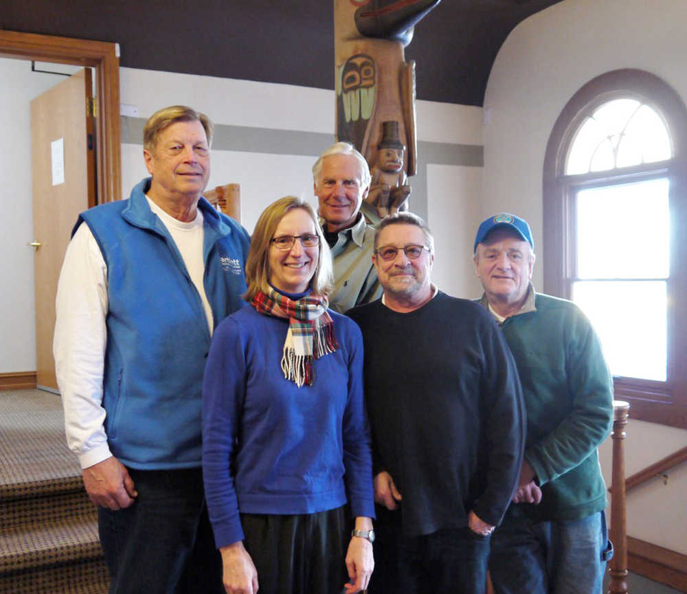 Juneau Community Foundation executive director Amy Skilbred, second from left, stands with Tom Gill, second from right, and Jim Carroll, right, of the Juneau Volunteer Fire Department after establishing the JVFD's Youth Activities Fund through the foundation. Also shown are JCF board members Reed Stoops, center, and Bob Storer, left.