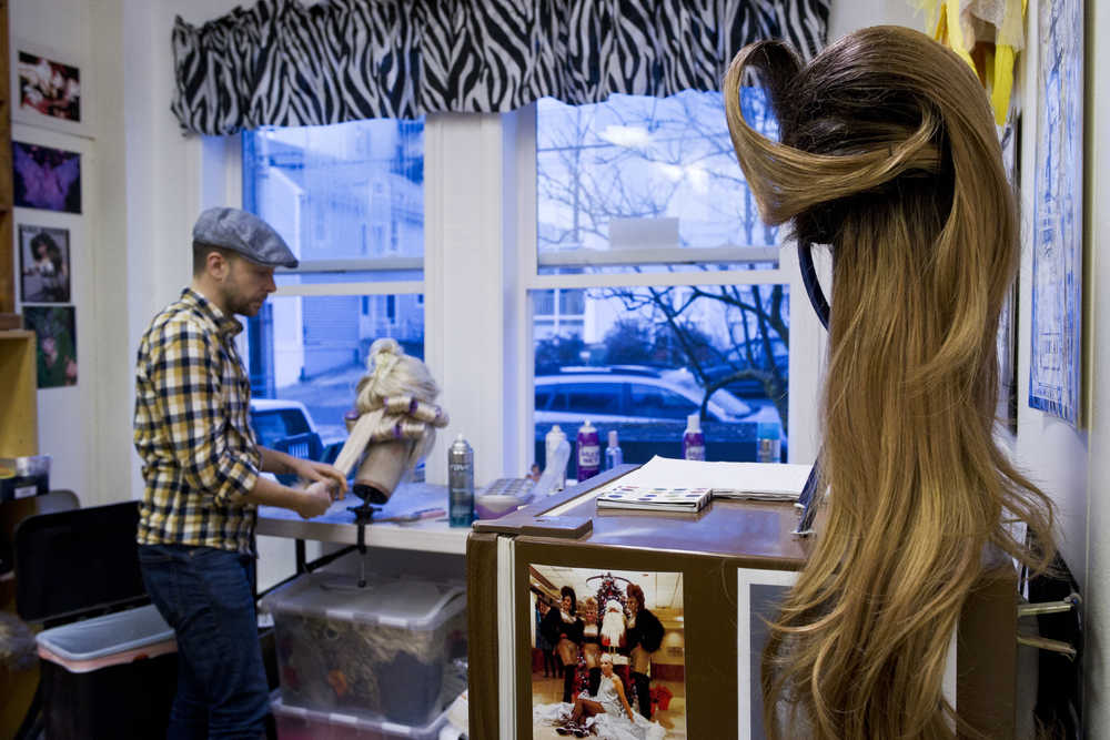 James Hoagland works at his wig shop in downtown Juneau in early December.