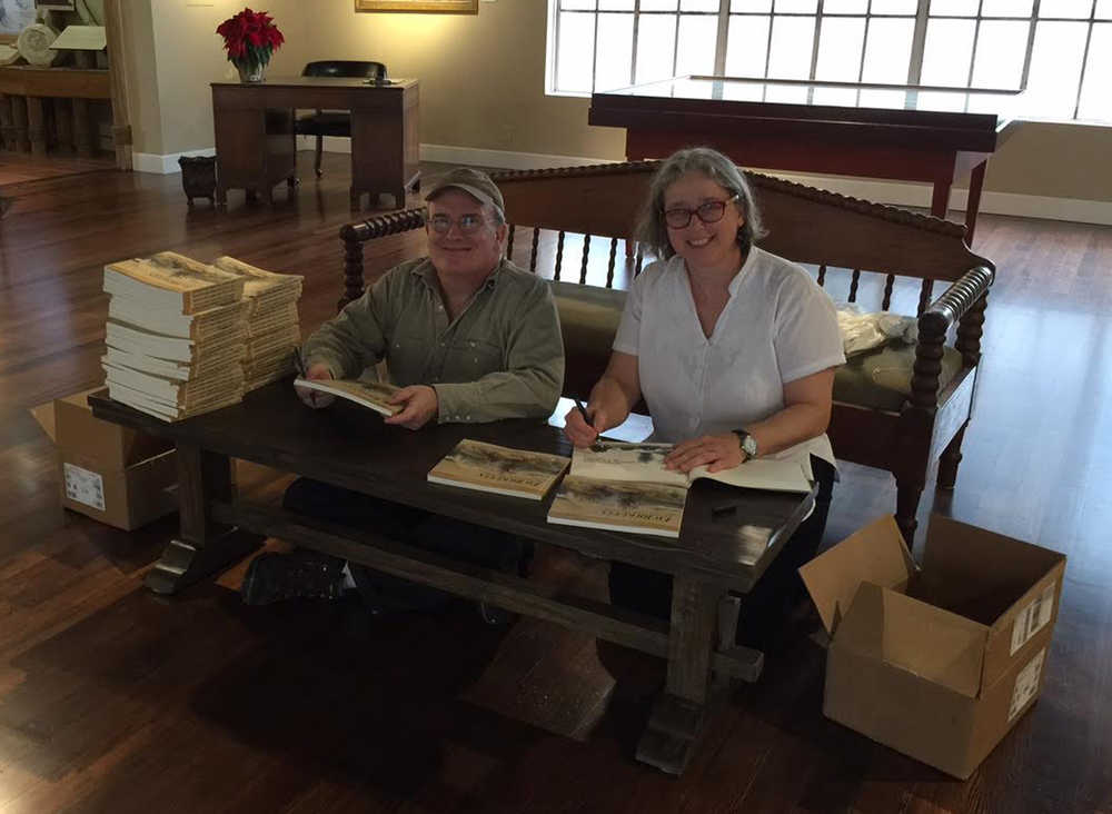 John and Jan Straley of Sitka presign books at the Pacific Grove Museum.