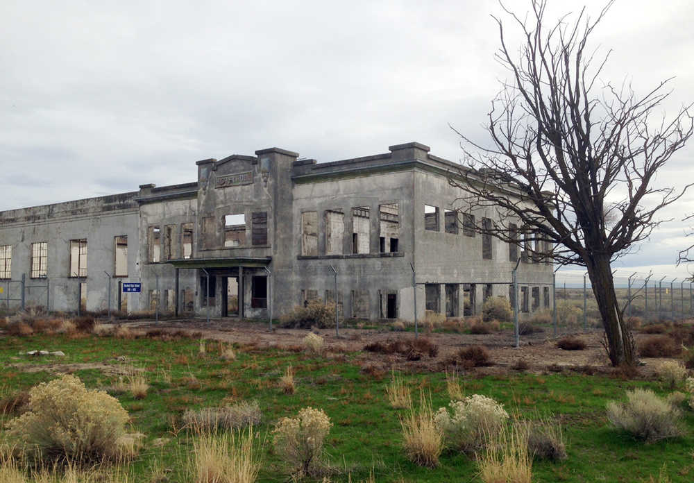 In this undated photo, the ruins of the old Hanford High School are shown near Richland, Washington. The towns of Hanford and White Bluffs were evacuated to make room for the Hanford Nuclear Reservation, which made the plutonium for the atomic bomb dropped on Nagasaki, Japan, and the ruins of the high school and other buildings are now part of the nation's newest national park, called the Manhattan Project National Historic Park.