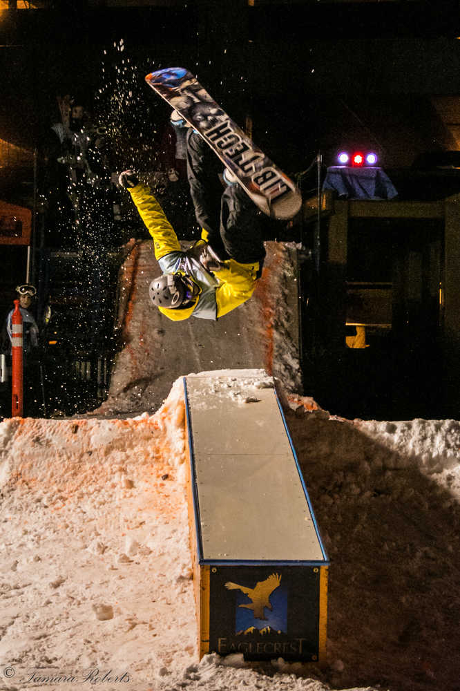 Juneau resident Christian Jacobs flips during Eaglecrest's Downtown Rail Jam on Saturday.