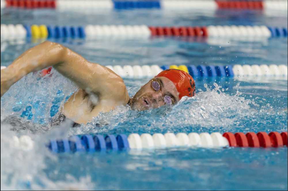 Nick Rutecki, a 2010 Juneau-Douglas High School alumnus, is shown competing at the first annual Duel at the Pool held at the Dimond Park Aquatic Center on Saturday. Rutecki finished first among male competitors.