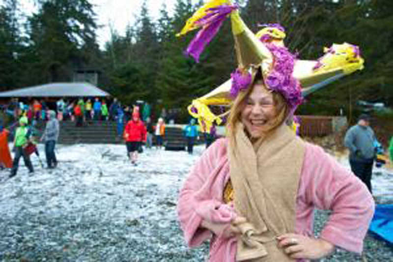 Brenda Krauss came with a hat to welcome in the new year at the 24th annual Polar Bear Dip at the Auke Village Recreation Beach.