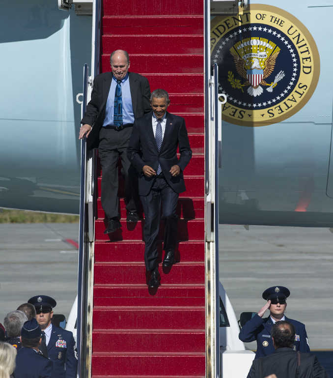 Pres. Barack Obama arrives on Air Force One at Joint Base Elmendorf-Richardson in Anchorage with Gov. Bill Walker on Aug. 31.