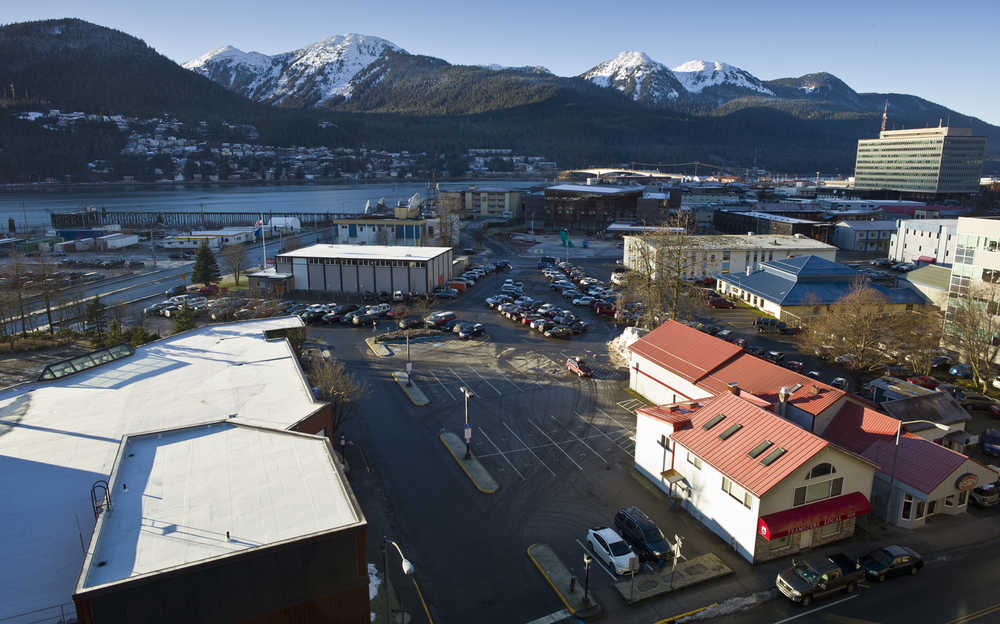 The Juneau Arts and Humanities Council has outlined new, slimmer plans for an arts complex in the Willoughby District, seen here on Jan. 4, 2016. The plans call for an $18.8 million renovation and expansion of the Juneau Arts and Culture Center (center left). If followed, the plans call for the building to be expanded toward Centennial Hall (bottom left).