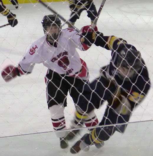 The Juneau-Douglas Crimson Bears hockey team came out of their two week winter hibernation with a 7 to 4 victory over the Bartlett Golden Bears on Friday night at the Treadwell Arena.